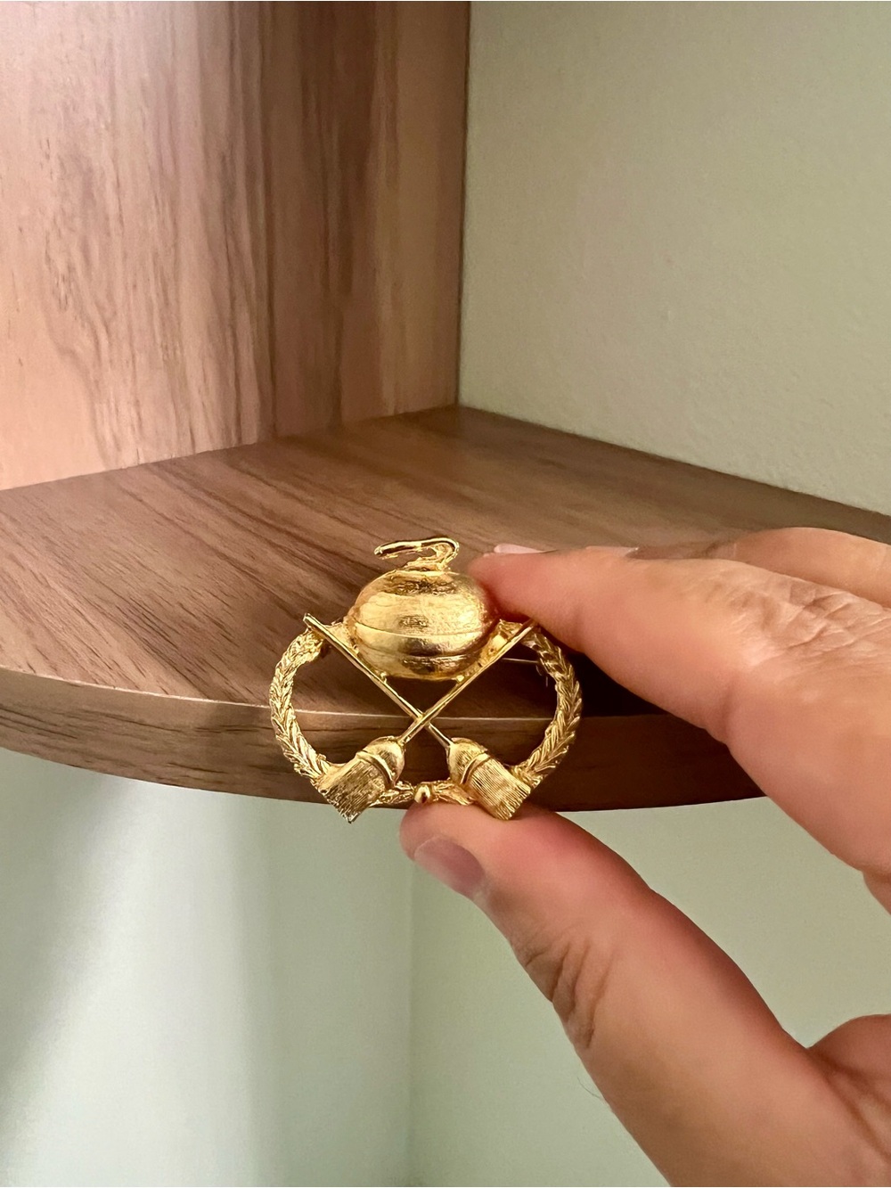 Gold Curling Brooch